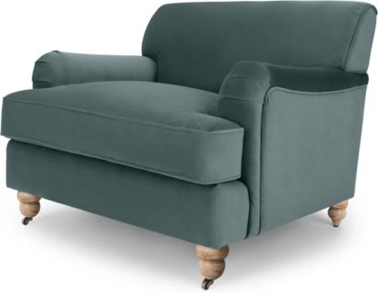 c590f8fcfe919afc3988ede296b2a14cc307bb3040dd0bdd557291a8d4464111.jpg An Image of Orson Armchair, Marine Green Velvet