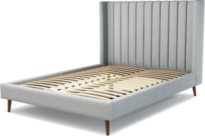 470e5a4446e9df3df25c7b6399063a2e121ff4e69fc084769056ee4541dcda91.jpg An Image of Custom MADE Cory King size Bed, Wolf Grey Wool with Walnut Stained Oak Legs