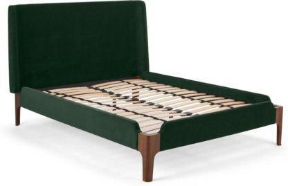 4bb38124459ed2afd558798d0a5b54e449aafa6ea7087fa75b9fbfaa377fa043.jpg An Image of Roscoe King Size Bed, Pine Green Velvet & Dark Stain Oak Legs