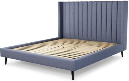 88c5d2d3e6fbac5d1320282a50d57776466ae265546876130d14bfb69c6ba900.jpg An Image of Custom MADE Cory Super King size Bed, Denim Cotton with Black Stained Oak Legs