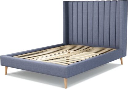 98bacf0ee7e13c8a028c961bc5844800d9de6adbaa9ba5d0e0e5b5e6c8ca788c.jpg An Image of Custom MADE Cory Double size Bed, Denim Cotton with Oak Legs