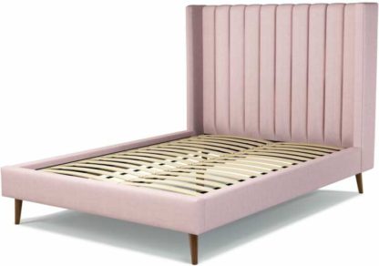 c13c971e60f712affff6b04d6853fba8aa774e656e8760ce68941ad7b3afb568.jpg An Image of Custom MADE Cory Double size Bed, Tea Rose Pink Cotton with Walnut Stained Oak Legs
