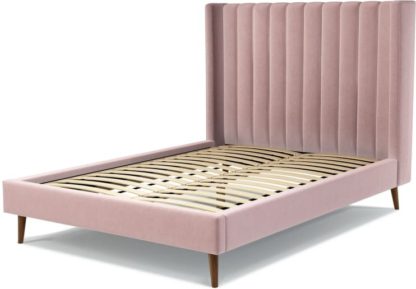 f04926075e998ded47a3ac62f4a083c9032f3816f455da2ddefd7ec3759ed7ff.jpg An Image of Custom MADE Cory Double size Bed, Heather Pink Velvet with Walnut Stained Oak Legs