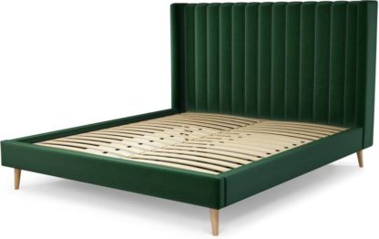 fd66ada3b51d184a831bee26d6db14fe3f197c4954d0c598cd451fedf0b972f3.jpg An Image of Custom MADE Cory Super King size Bed, Bottle Green Velvet with Oak Legs