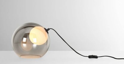 1276854e28b628e98c3b166a9b71437cda555bec43871d49e3d6bf061fcfa503.jpg An Image of Masako LED Table Lamp, Smoked and Opal Glass
