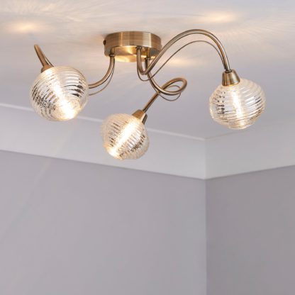 2073cba72513c4582df374290c871c59924c56fe037025653290ca665ec68bdd-1.jpg An Image of Temossi 3 Light Mercury Glass Semi-Flush Ceiling Fitting Champagne, Antique Brass