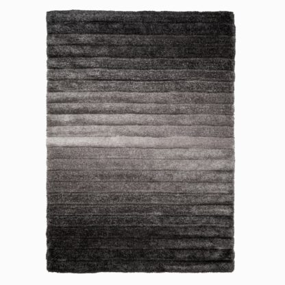 2dd3f4181ed4f65d4be82bc78648d4b3aac921d18ad46d1413143978e55b4288-1.jpg An Image of Verge Ombre Rug Ombre Grey