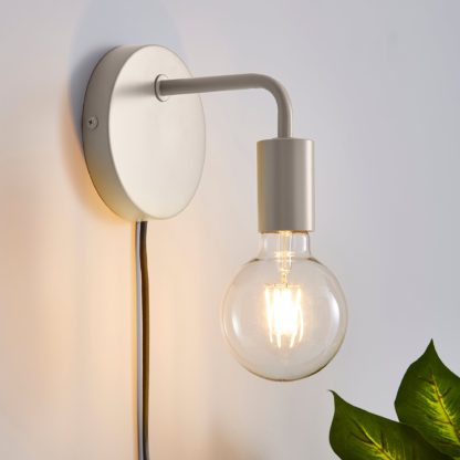 3765143bf9bc277dc2b0636c01b3cdca28e12f5fd1eea3a83bf099f61544ef4e-1.jpg An Image of Grey Koppla Plug-in Wall Light Black