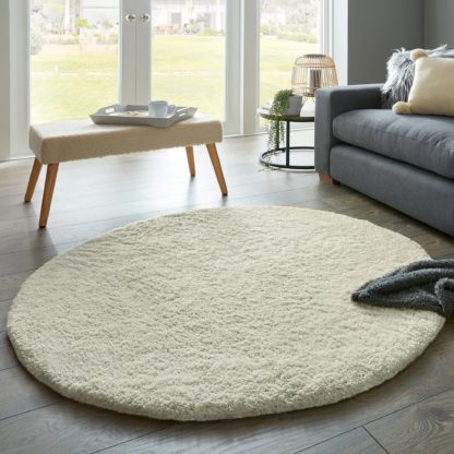 37bd300fe94bc587ac1e42d43b9f9739103303e87ef6b289a6469af259be51cf-1.jpg An Image of Cosy Teddy Round Rug Yellow