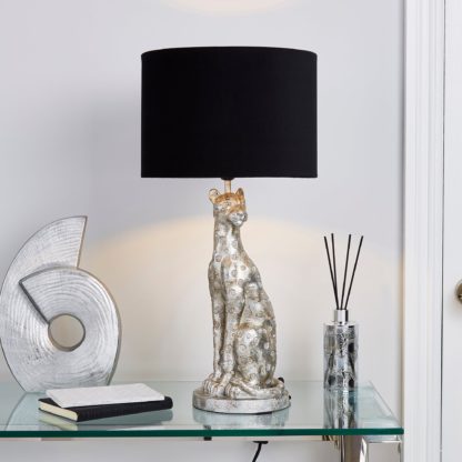 3c999485203f1c988c5e2502e853e426de29804e28e50085289e1a9d9c2fdd35-1.jpg An Image of Leon Leopard Table Lamp Silver