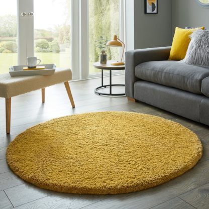 3f6cd0df8e0d50998d35a6cba87635b3b9d0733e95c0fc09cea6dc3b74505871-1.jpg An Image of Cosy Teddy Round Rug Yellow