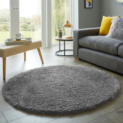 425eea34a0537ab701c3d50147c37768e1d3e951ec9f7562ca8c96469d434f8b-1.jpg An Image of Cosy Teddy Round Rug Yellow