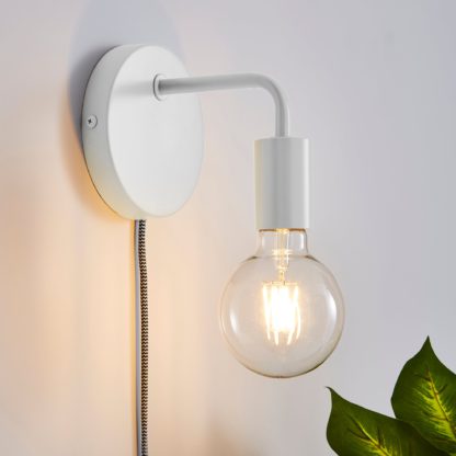 5fc6bbc49b2360e93340b182a96679f0f62724f8b3eae0b3c3a2b72faa046b65-1.jpg An Image of Pink Koppla Plug-in Wall Light Black