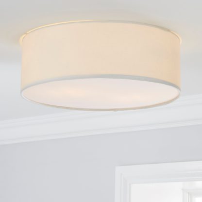 832d9ebf667f1d8b65e8e575f89378cbda7d193c25f730a226fbbd6b90f2b84d-1.jpg An Image of Sara 38cm Ivory Shade Flush Ceiling Fitting White