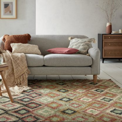 91a64143bf745ea7a66181b390b921025a3ca9a67668cb9dc82cb41756f10327-1.jpg An Image of Marcella Jute Flatweave Rug Beige, Green and Black