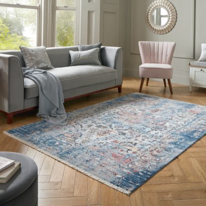 bae2f130b10c0a30778d4aaf832f8695c08b2742cf1adb5c2c2813f4390c1df0-1.jpg An Image of Soraya Traditional Rug Blue, Orange and White