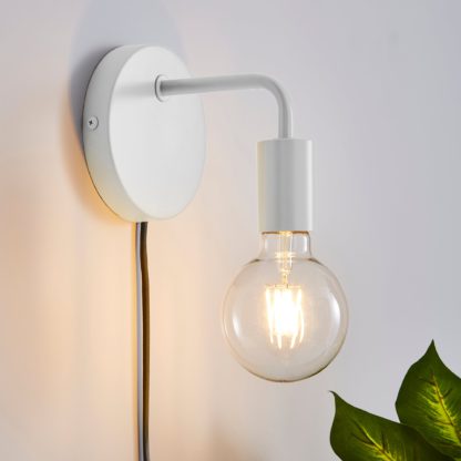 bb4264c1dfc8154434ea75a8976fae6f9d168185d6991a9ccdee8cfccccb64d9-1.jpg An Image of Pink Koppla Plug-in Wall Light Black