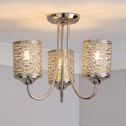 c74c41ad65d683d811fa8f7b040ea4ca6275b7b6e2173a19f525d83a727502f7-1.jpg An Image of Tunis 3 Light Fretwork Nickel Ceiling Fitting Champagne