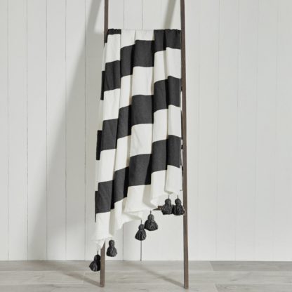 db926abacd30937f9fc9a20d14ae7eb08a0d790c1cab31404228361d4599d0a3-1.jpg An Image of Lucas Stripe 150cm x 200cm Throw Pink and White