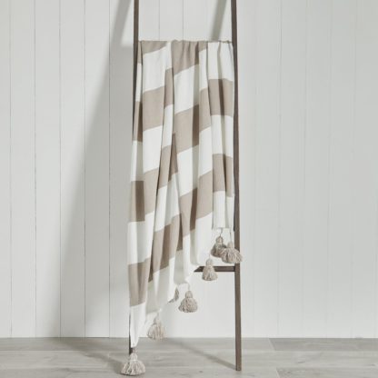 e1573fe56e4a26c953e8d4d130b9774bb8cc5badeae980273c043f2d27e7e388-1.jpg An Image of Lucas Stripe 150cm x 200cm Throw Pink and White