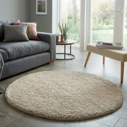 ee196f66608e12874ad840d6981948d205595a6d27569d12c16a39222c5ba7bc-1.jpg An Image of Cosy Teddy Round Rug Yellow