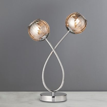 44c5d88557f9d1dc6c17b6f4fed2ee348821f4c31b5f5605d6b7a22703e4429c.jpg An Image of Arta 2 Light Smoked Glass Table Lamp Chrome