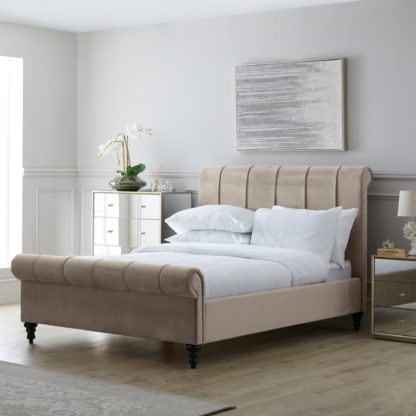 74f058f653d5af72ec5ca158bf4fd9d79066846d008b482c3f54e25d31bd6ce8.jpg An Image of Classic Taupe Pleated Bed Taupe (Cream)