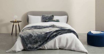 c344bee14ed539686b98c5d51a622d289aa1376e197b9c701adde6ef81e635ba.jpg An Image of Adelphi Luxury Faux fur cushion 50x50cm, Blue