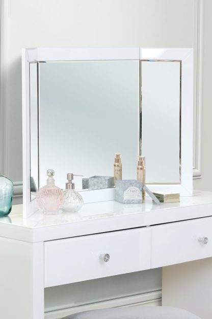 f0b3e8f8668255bd57d260f6754f4d4891b7eccfc18f1cf6614499d1912ad984.jpg An Image of COLLETA White Triple Folding Mirror