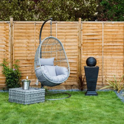 899954f28f3d04af555f5e177e4699fcdc1486602094d15f4760850d1e388a24.jpg An Image of Rattan Egg Shaped Swing Chair Grey