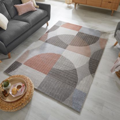 ffe9f7b16ce80f02b53c68b912d5571a891a523425b8f31d2488224f2439420d-1.jpg An Image of Centro Circles Rug Centro Circles Grey Ochre