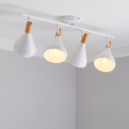 3f9b95b429a4df7c44fe85107d43a1d74b14ec0479f5d51d0f49dfae4d771db6.jpg An Image of Wolston 4 Light Spotlight Bar White
