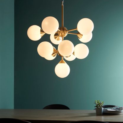 8528a8d875de19f0a2da3980b3fecdb868e92c5b49920aca626e919835b71742.jpg An Image of Vogue Elberton 11 Light 51cm Chandelier Brass