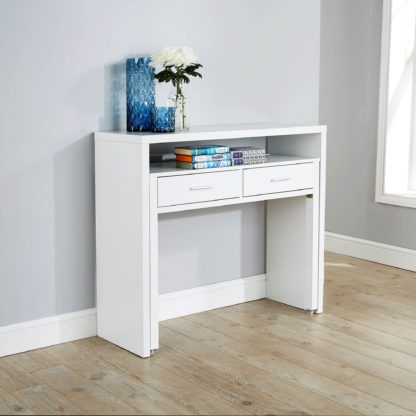 d68aea56e9cbebeb1ce8056093149ea639151409d292066eedbd3801fe7f3e76.jpg An Image of Regis White Hideaway Console Desk White