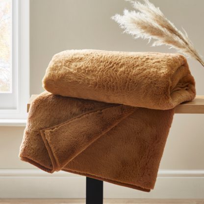 3e5b5f9cfea36fca66b00baed1af11b2f878ac0939cba5adbe6eefcde1b75e1e.jpg An Image of Aspen Camel Throw Camel