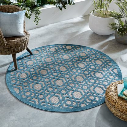a1868be22ed24d1483a174ccc5e3793b228e9a9a520f1ee5882be8e72577b17d.jpg An Image of Oro Blue Circle Geometric Indoor Outdoor Rug Blue and Brown