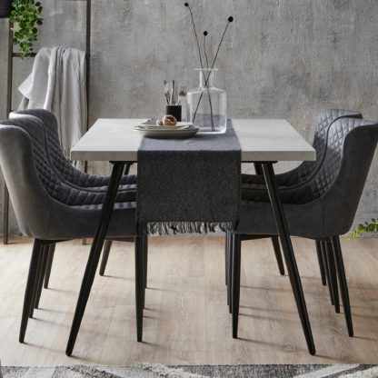 d764ae022ecfc5fe7cc76ce83fd17df531893d37ca512bc6dabcb86b3ee92d25.jpg An Image of Zuri Concrete Effect Rectangular Dining Table Grey