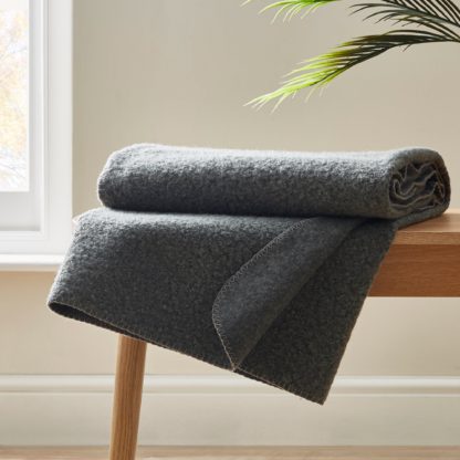 dfc3ca1ac199a7ffc2717de5b3781db0ceb6e142ebd4c419a0b5dabb2cc2cf3e.jpg An Image of Boucle Grey Throw Grey