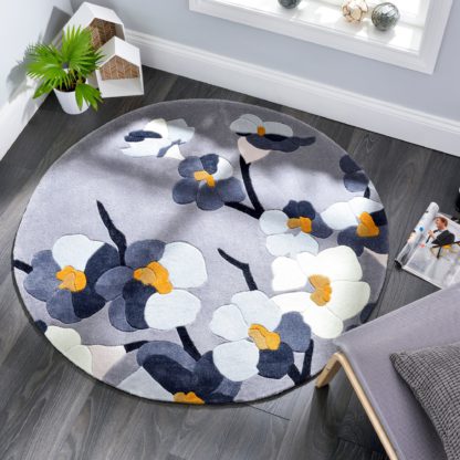 105f4cfecef30619a1b57f8461ccfca3ff4bd4dea5bdc0163ef10709925ee5d9.jpg An Image of Infinite Blossom Circle Rug Pink