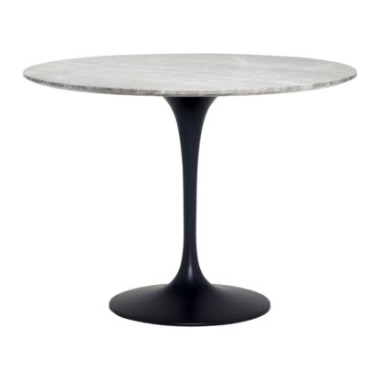 8d41305144699e9da58449006039c758265be1492bf365664231476bd59fd279.jpg An Image of Nell Round Dining Table