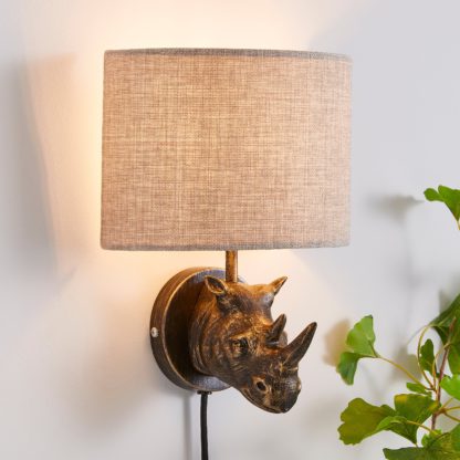 9c61c21ad8b65fafe8e7c784a76c3e5fcb131dff8f06ce005344b9003246b8d6.jpg An Image of Rob The Rhino Easy Fit Plug In Wall Light Bronze