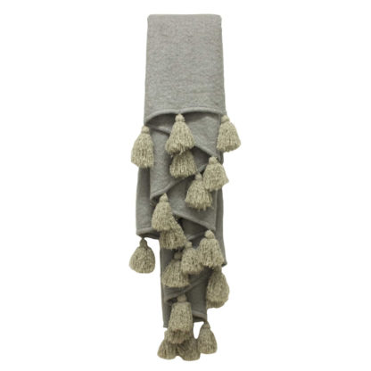 a2373de65621d4ae8e761a556ad248e6cdcb17ebbb12d6ab1b96a9e73d533877.jpg An Image of Natural Tassel Throw