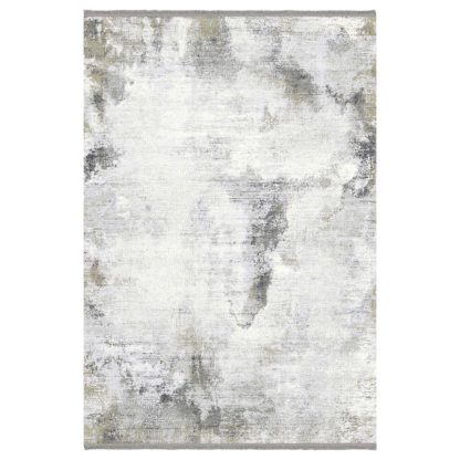 b9a80a8751cff49e0224e3367f6dffb32e0ffcf0b007439b963a030a3d958162.jpg An Image of Metallic Impression Rug, Blue