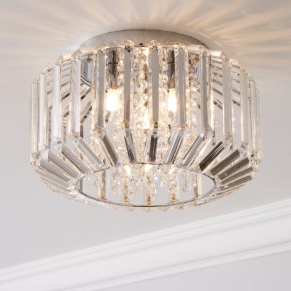 bc916f0e6eb3337548360bd660dc26130f4fc938c434be54ae5ff87387dd6921.jpg An Image of Chantilly Flush Ceiling Fitting Chrome