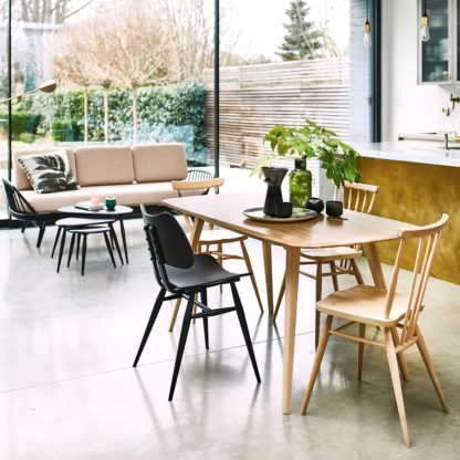 c25449f9a17242e4e7154d9910024300677cb4779261273bd47efef412390d20.jpg An Image of Ercol Originals Retro Plank Dining Table, Wood