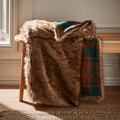 cc2fc7e5394724b3eb5fe7ecf8e864cc5940eb5986004d539d3978264b2ad298.jpg An Image of Alpine Check Faux Fur Throw Brown