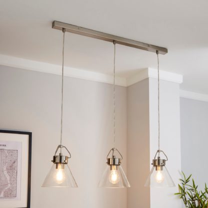 264bf53764f617787d509865636f61192db7141c43fc23aa29e8d5a9af33e707.jpg An Image of Delavin 3 Light Glass Diner Ceiling Fitting Silver