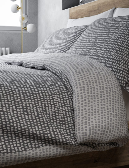 38111a0a2d96fa277d1979c8a26c751b708750be3f75acefddc713dea60ade43-2.jpg An Image of M&S Isla Geometric Bedding Set