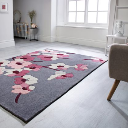792a8a315f12edc05c18e7076254b4f81201d1dd8b6b9a7f6541fcbbdfb1c3e9.jpg An Image of Blossom Rug Pink, Red and Blue