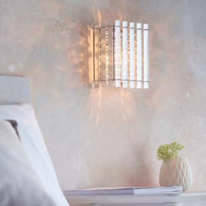 ecc8bad1c47bc292a29631d0a1bac88724347388eae430f8f9332531f263a55b.jpg An Image of Vogue Blessing Wall Light Chrome
